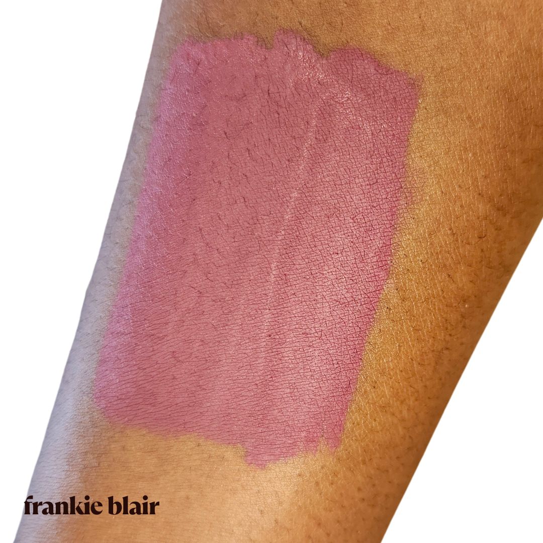Frankie Blair Liore Matte Lip Stain swatch on arm, a modern mauve matte lip stain. Long lasting and hydrating.