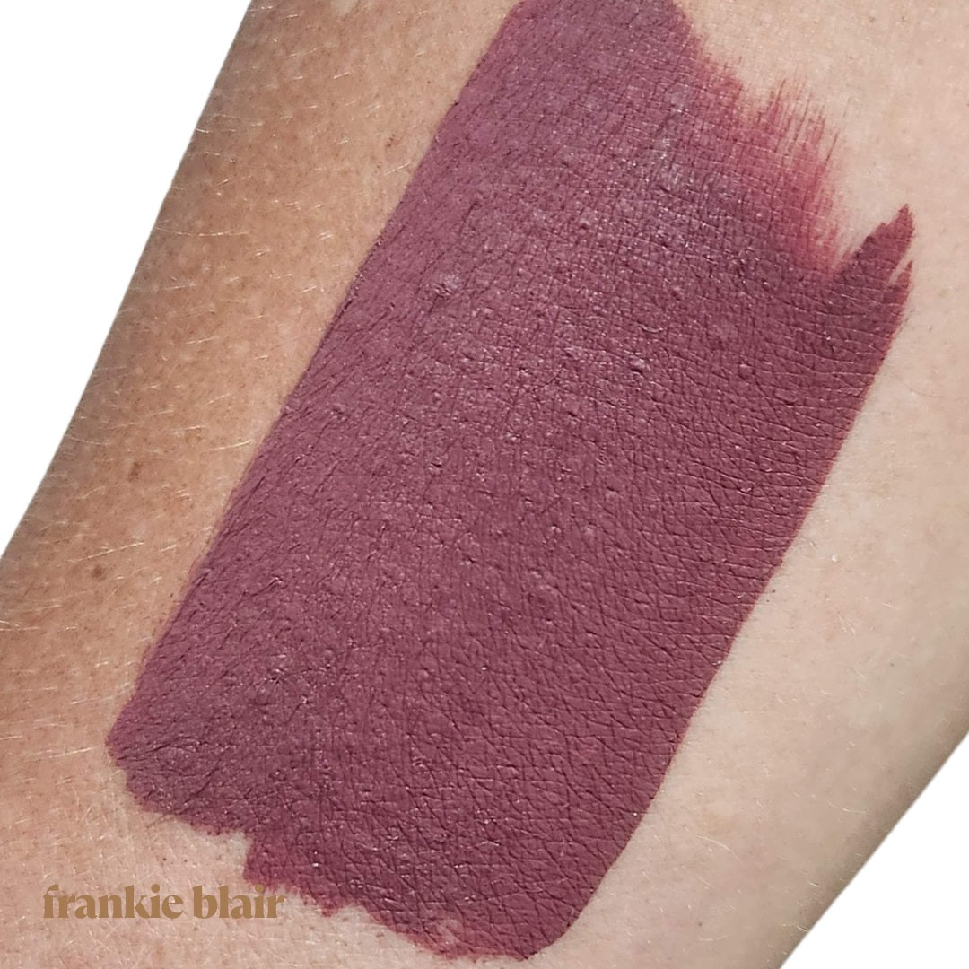 Frankie Blair Liore Matte Lip Stain Arm Swatch, a modern mauve matte lip stain. Long lasting and hydrating.