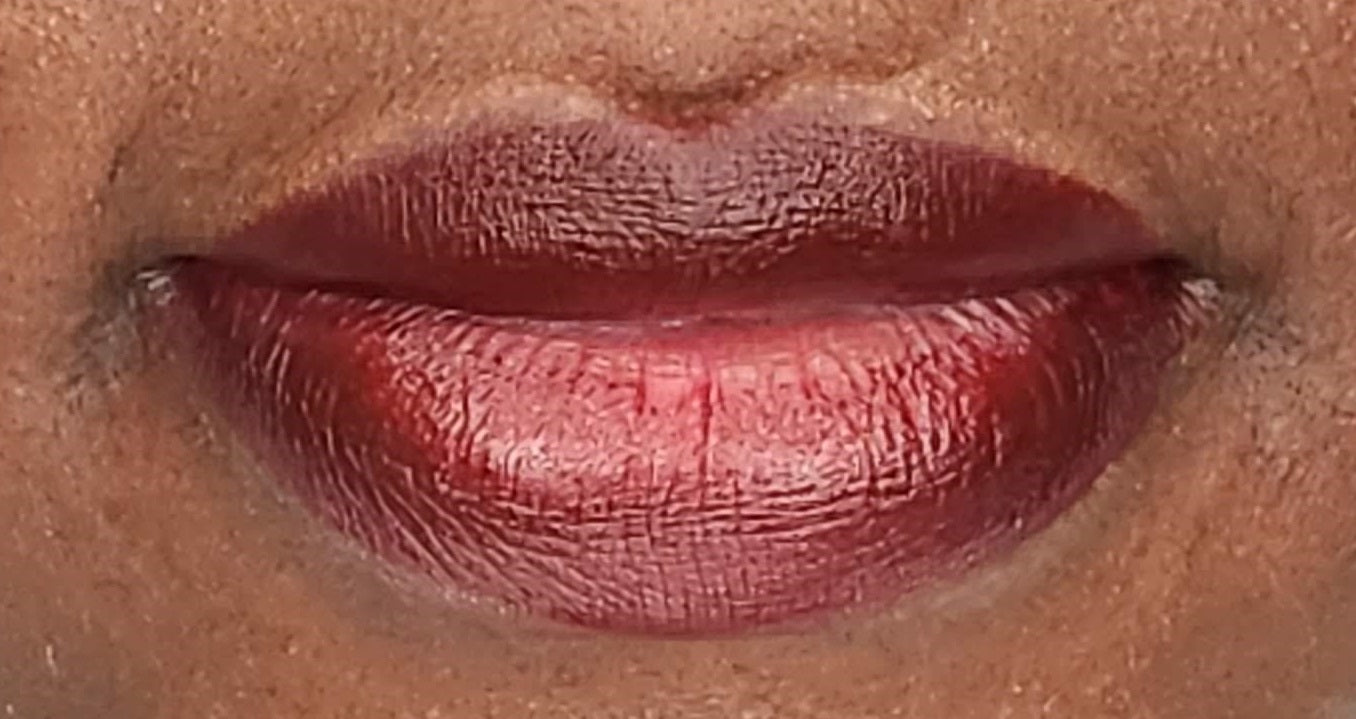 Women wearing Frankie Blair Lennox Matte Lip Stain, a dark chocolate brown with berry undertone lip stain.