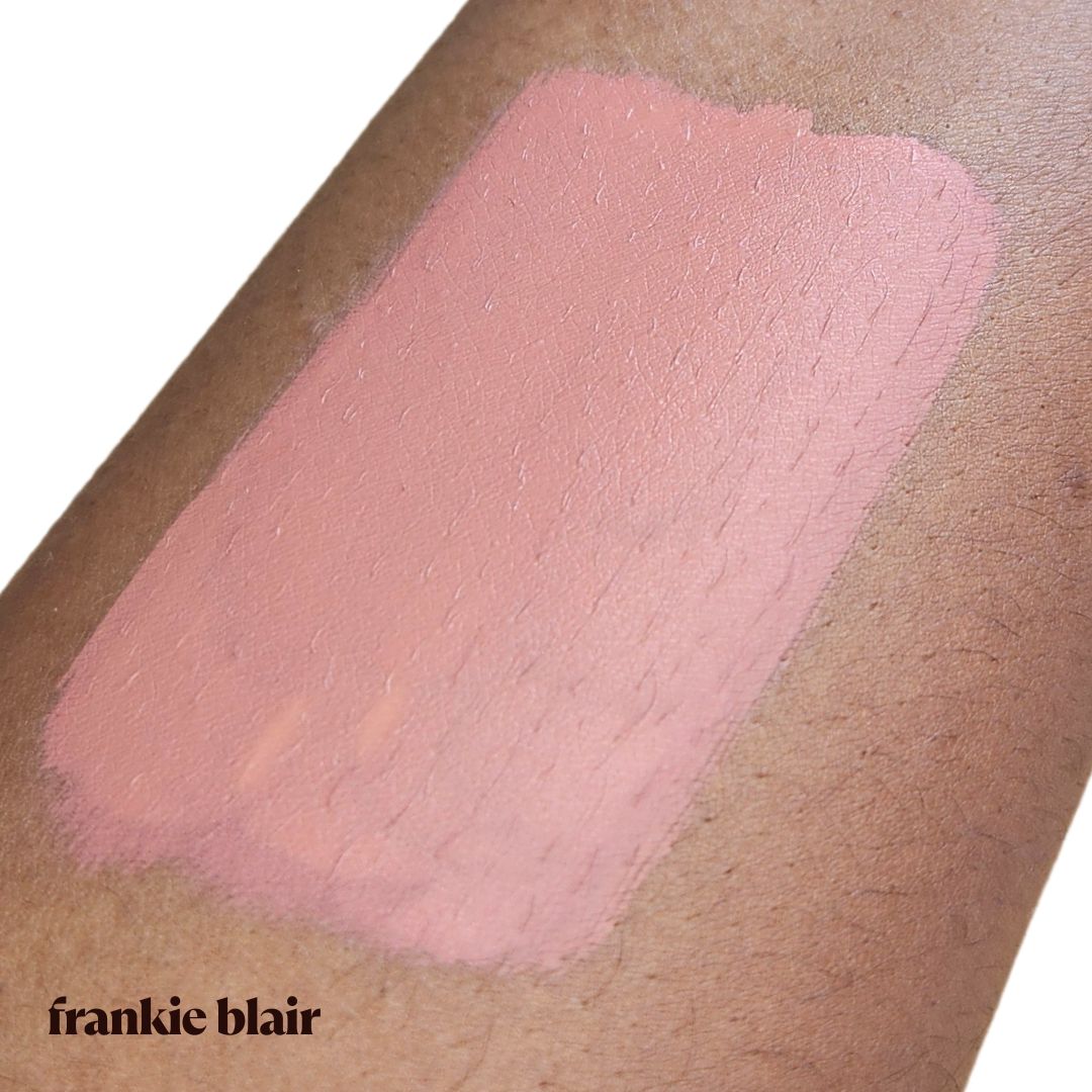 Frankie Blair O.G Frankie Matte Lip Stain on arm swatch, a modern 90s brown lip stain that is long lasting and hydrating.