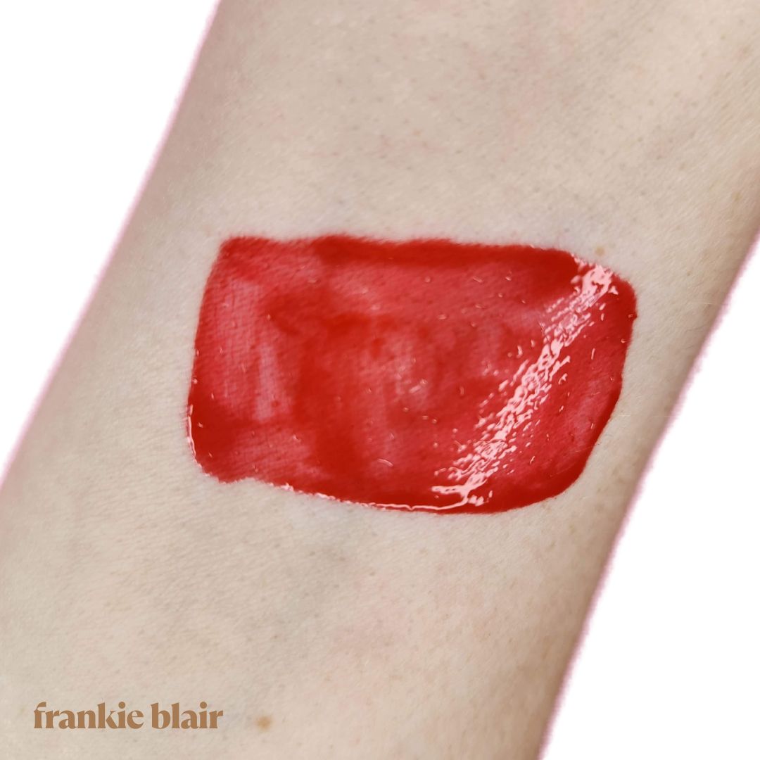 Frankie Blair Lip Gloss Ziba a vibrant red lip gloss.